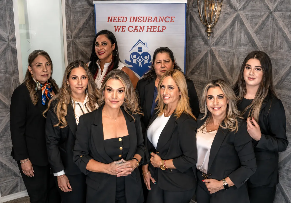 The Good Deal Insurance Agency team standing together in the office